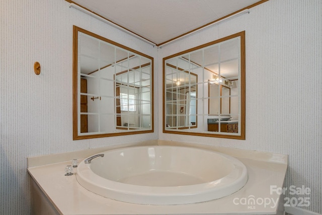 bathroom featuring wallpapered walls