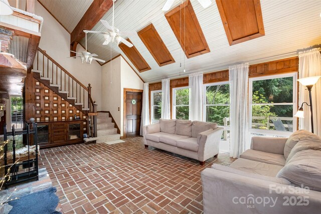 1160 Walton Pl, Salisbury, NC 28146 - living area featuring stairway, a wood ceiling with exposed beams, high vaulted ceiling, brick flooring, and ceiling fan