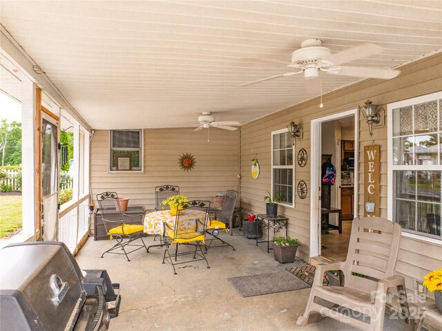 804 Rostan St SE, Valdese, NC 28690 - sunroom / solarium with a ceiling fan and outdoor dining space