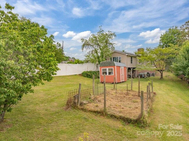 804 Rostan St SE, Valdese, NC 28690 - view of yard featuring a storage shed and an outdoor structure