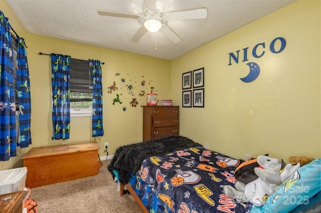 804 Rostan St SE, Valdese, NC 28690 - bedroom featuring carpet floors, a textured ceiling, and a ceiling fan