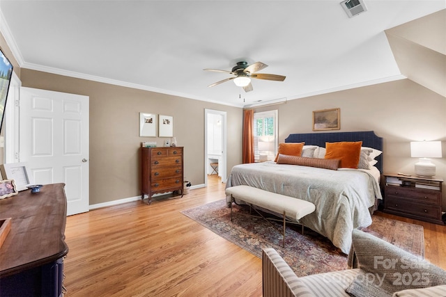 bedroom with visible vents, baseboards, crown molding, and light wood-type flooring