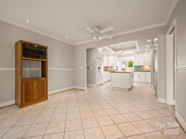 kitchen with refrigerator with ice dispenser, ornamental molding, white cabinets, recessed lighting, and backsplash