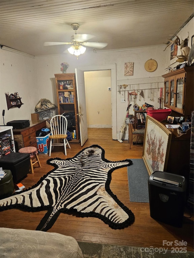 621 Benton St, Monroe, NC 28110 - living room with a ceiling fan and wood finished floors