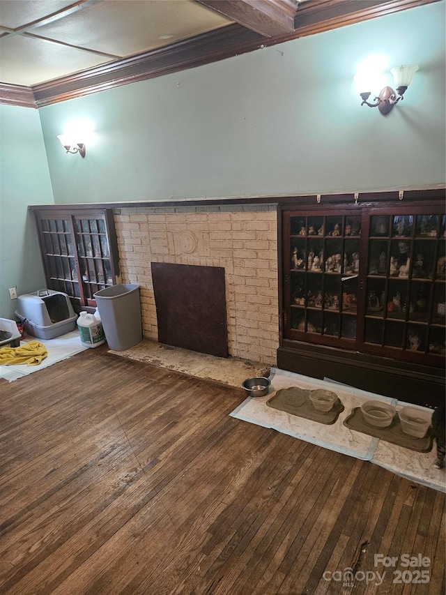 621 Benton St, Monroe, NC 28110 - living room with a brick fireplace, crown molding, and wood-type flooring