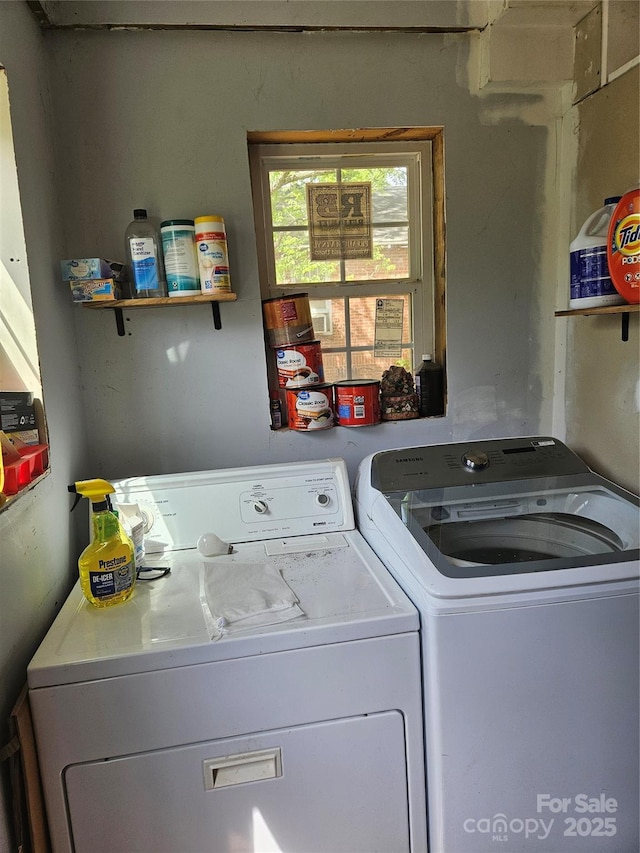 621 Benton St, Monroe, NC 28110 - laundry room featuring washer and dryer and laundry area