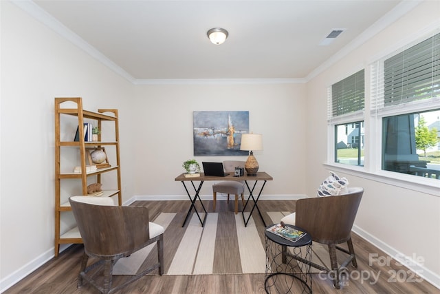 office area featuring wood finished floors, ornamental molding, and baseboards