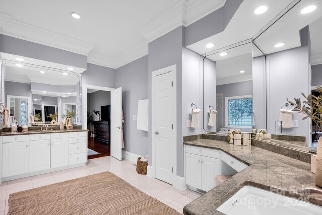 bathroom with crown molding, recessed lighting, tile patterned floors, and vanity