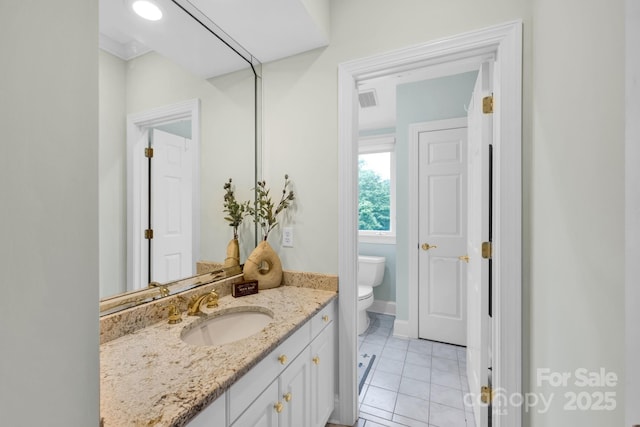 bathroom with toilet, visible vents, tile patterned flooring, and vanity
