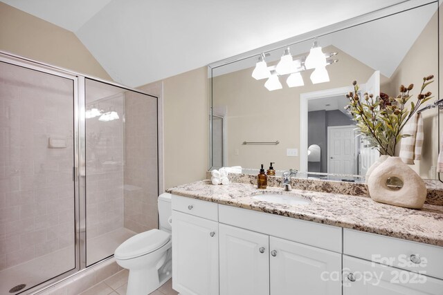 full bath with vanity, toilet, tile patterned floors, a shower stall, and vaulted ceiling