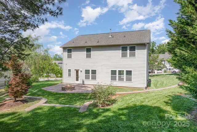 1071 Bassett Way, Fort Mill, SC 29707 - back of house featuring an outdoor fire pit, a patio, and a lawn