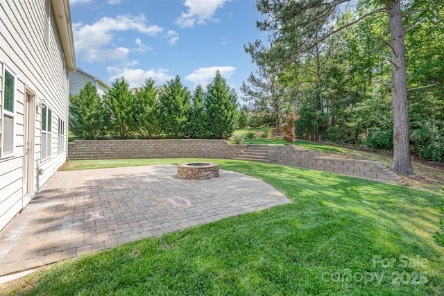 1071 Bassett Way, Fort Mill, SC 29707 - view of grassy yard with an outdoor fire pit and a patio