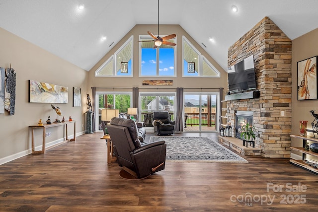 living area with wood finished floors, a fireplace, high vaulted ceiling, recessed lighting, and a ceiling fan