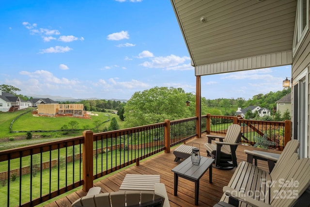 deck featuring a yard