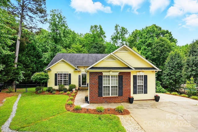 2745 Stockwood Dr, Gastonia, NC 28056 - view of front of home featuring brick siding and roof with shingles