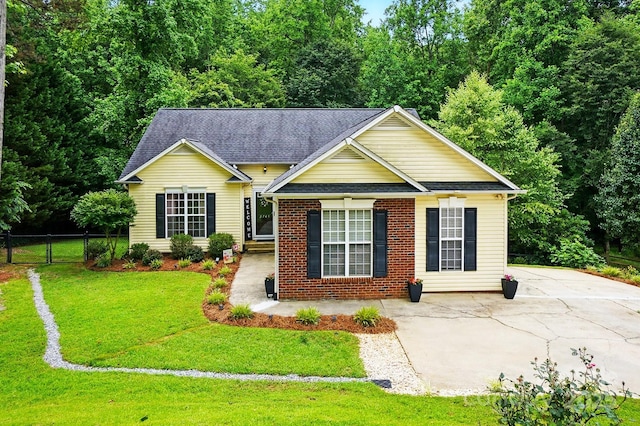 2745 Stockwood Dr, Gastonia, NC 28056 - view of front facade with brick siding, roof with shingles, and a gate