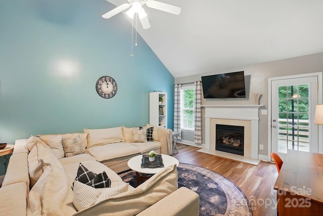 2745 Stockwood Dr, Gastonia, NC 28056 - living area with ceiling fan, wood finished floors, high vaulted ceiling, and a fireplace with flush hearth