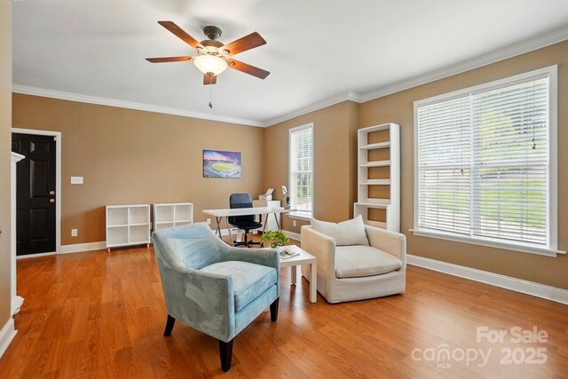 2745 Stockwood Dr, Gastonia, NC 28056 - sitting room featuring ceiling fan, light wood finished floors, baseboards, crown molding, and a desk