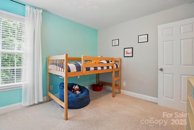 2745 Stockwood Dr, Gastonia, NC 28056 - carpeted bedroom with multiple windows and baseboards