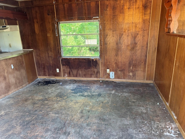 1029 Sullivan St, Wadesboro, NC 28170 - unfurnished room with wooden walls and baseboards