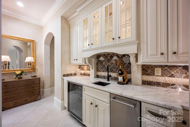 140 Lightship Dr, Mooresville, NC 28117 - indoor wet bar with beverage cooler, arched walkways, backsplash, dishwasher, and crown molding