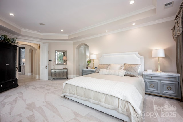 140 Lightship Dr, Mooresville, NC 28117 - bedroom with arched walkways, a tray ceiling, light colored carpet, ornamental molding, and recessed lighting