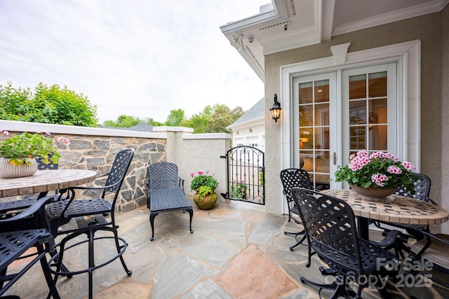140 Lightship Dr, Mooresville, NC 28117 - view of patio / terrace with outdoor dining area and a gate