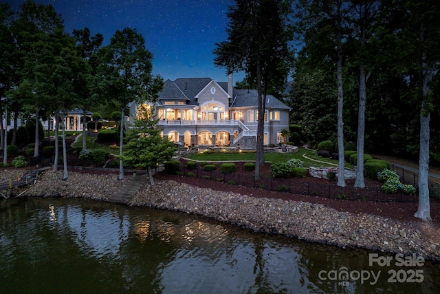 140 Lightship Dr, Mooresville, NC 28117 - back of property with stairs, a chimney, a water view, and a balcony
