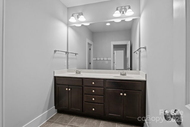 10822 Brandie Meadow Ln, Huntersville, NC 28078 - full bath with double vanity, baseboards, and tile patterned floors