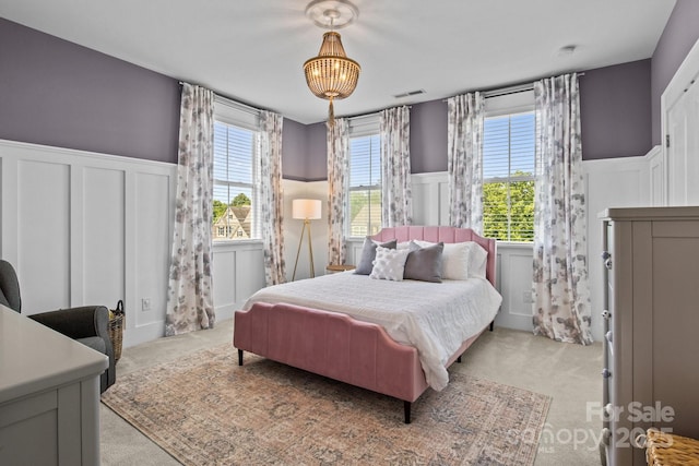 10822 Brandie Meadow Ln, Huntersville, NC 28078 - bedroom with a decorative wall, a wainscoted wall, and carpet floors