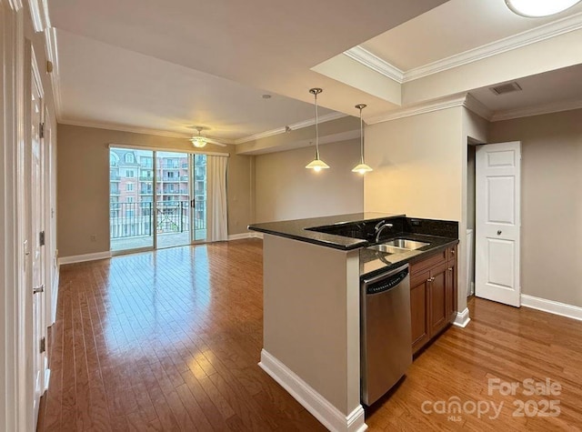 kitchen with stainless steel dishwasher, baseboards, crown molding, and wood-type flooring