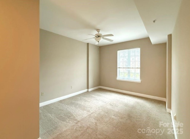 300 W 5th St Unit 404, Charlotte, NC 28202 - empty room featuring ceiling fan and carpet flooring