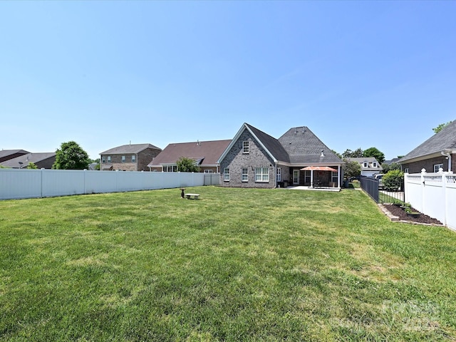 exterior space featuring a fenced backyard