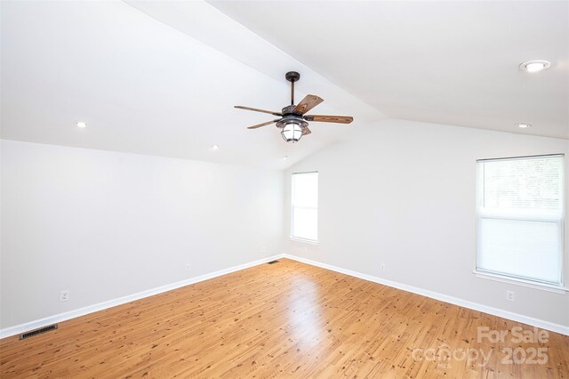 3933 Planters Pl, Indian Trail, NC 28079 - additional living space with a ceiling fan, light wood finished floors, vaulted ceiling, and recessed lighting