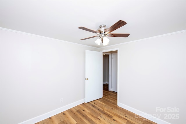 3933 Planters Pl, Indian Trail, NC 28079 - empty room with light wood-style floors, a ceiling fan, and ornamental molding