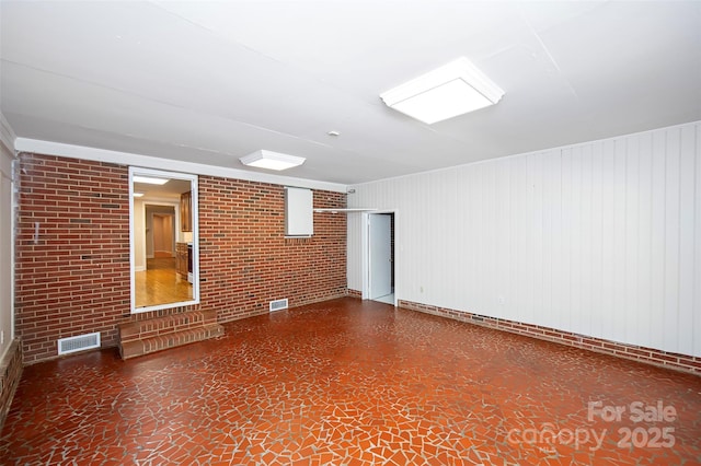 3933 Planters Pl, Indian Trail, NC 28079 - empty room featuring brick wall