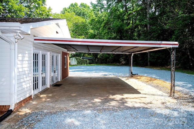 3933 Planters Pl, Indian Trail, NC 28079 - view of parking featuring french doors and gravel driveway