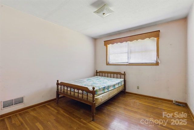 3120 Mineral Springs Mountain Rd, Valdese, NC 28690 - bedroom featuring wood finished floors and baseboards