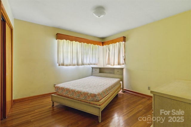 3120 Mineral Springs Mountain Rd, Valdese, NC 28690 - bedroom featuring baseboards, wood finished floors, and a closet