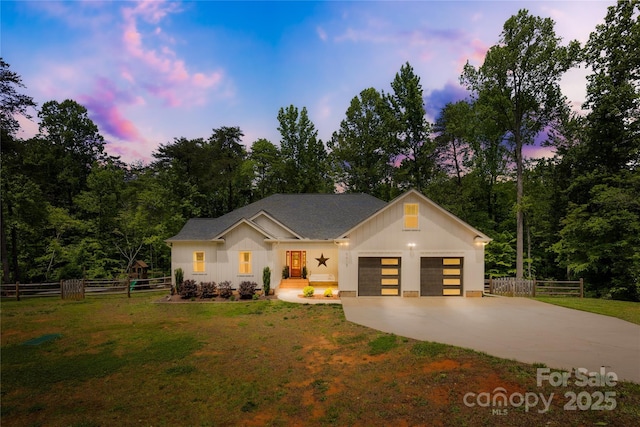 5615 American Way, Denver, NC 28037 - view of front of house featuring a lawn, board and batten siding, and driveway