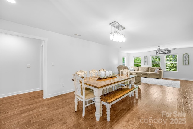 5615 American Way, Denver, NC 28037 - dining area featuring baseboards, a ceiling fan, wood finished floors, and visible vents