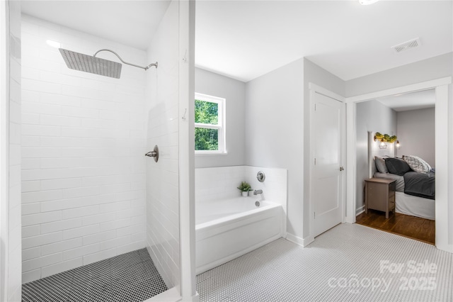5615 American Way, Denver, NC 28037 - ensuite bathroom featuring a garden tub, visible vents, tile patterned flooring, ensuite bath, and tiled shower