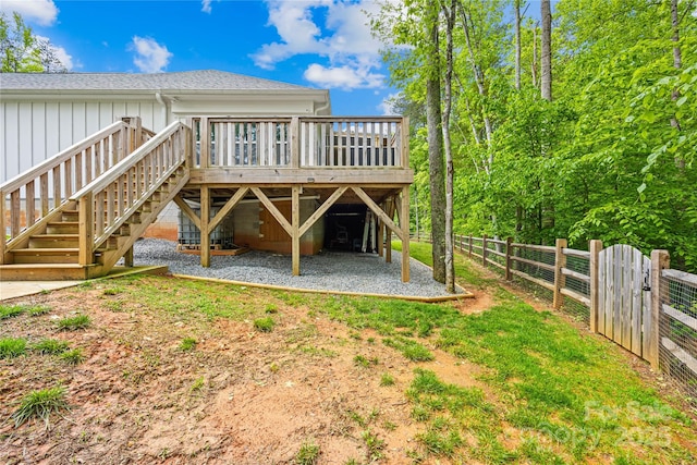 5615 American Way, Denver, NC 28037 - back of property featuring fence, a deck, stairs, a shingled roof, and board and batten siding