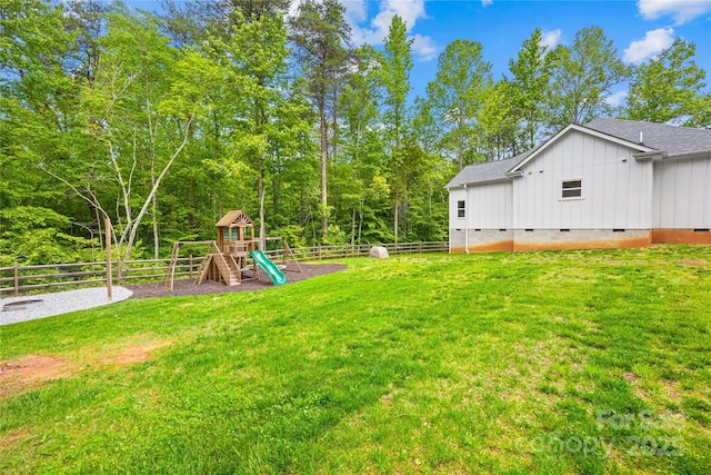 5615 American Way, Denver, NC 28037 - view of yard with a fenced backyard and a playground
