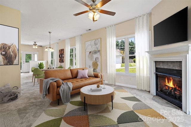 8 Cherry Laurel Ln, Swannanoa, NC 28778 - living room with ceiling fan, light colored carpet, a glass covered fireplace, and plenty of natural light