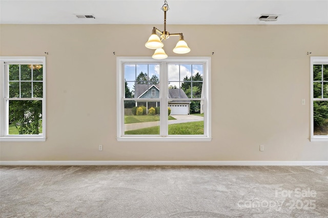 8 Cherry Laurel Ln, Swannanoa, NC 28778 - carpeted empty room featuring a chandelier, plenty of natural light, and baseboards