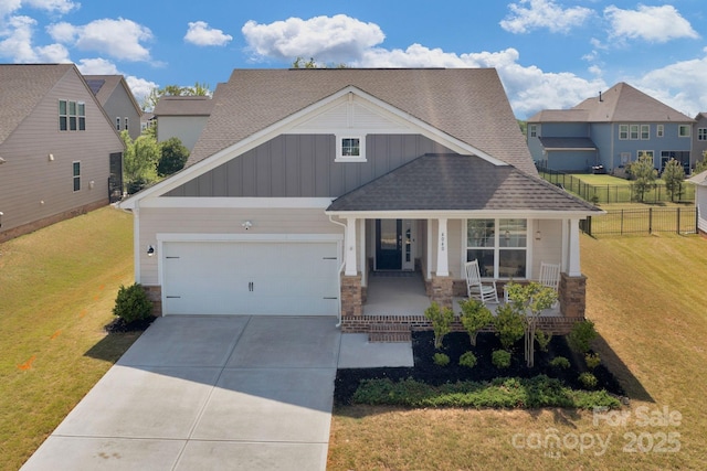 4040 Deep River Way, Waxhaw, NC 28173 - craftsman inspired home featuring a porch, board and batten siding, driveway, stone siding, and a garage