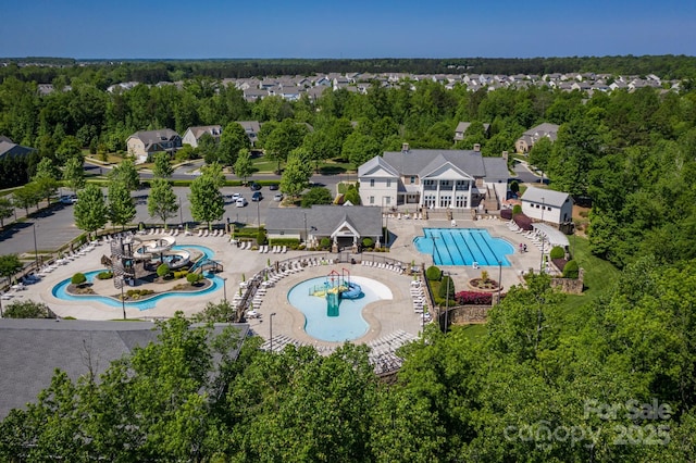 4040 Deep River Way, Waxhaw, NC 28173 - bird's eye view of a pool and a tree filled landscape