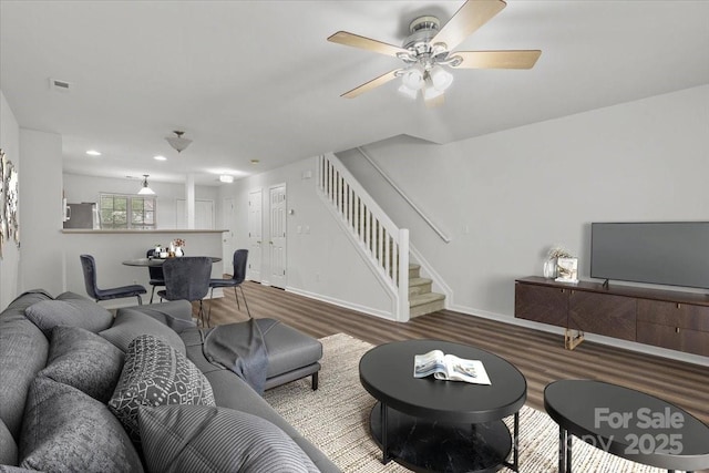 13660 Meade Glen Ct, Charlotte, NC 28273 - living area with stairs, wood finished floors, a ceiling fan, baseboards, and recessed lighting