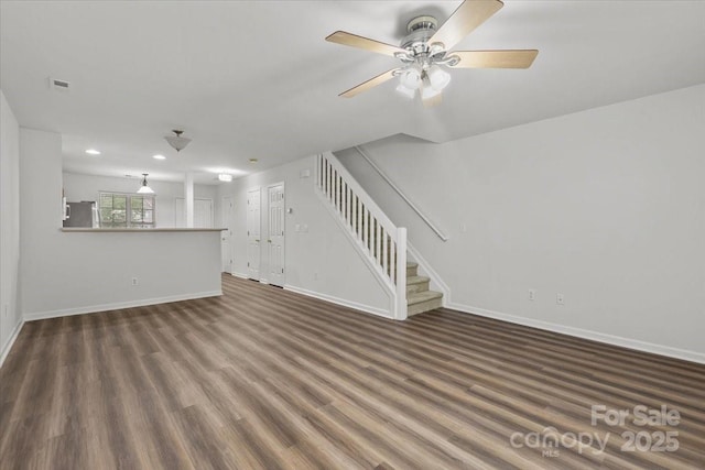 13660 Meade Glen Ct, Charlotte, NC 28273 - unfurnished living room featuring stairs, baseboards, recessed lighting, wood finished floors, and ceiling fan